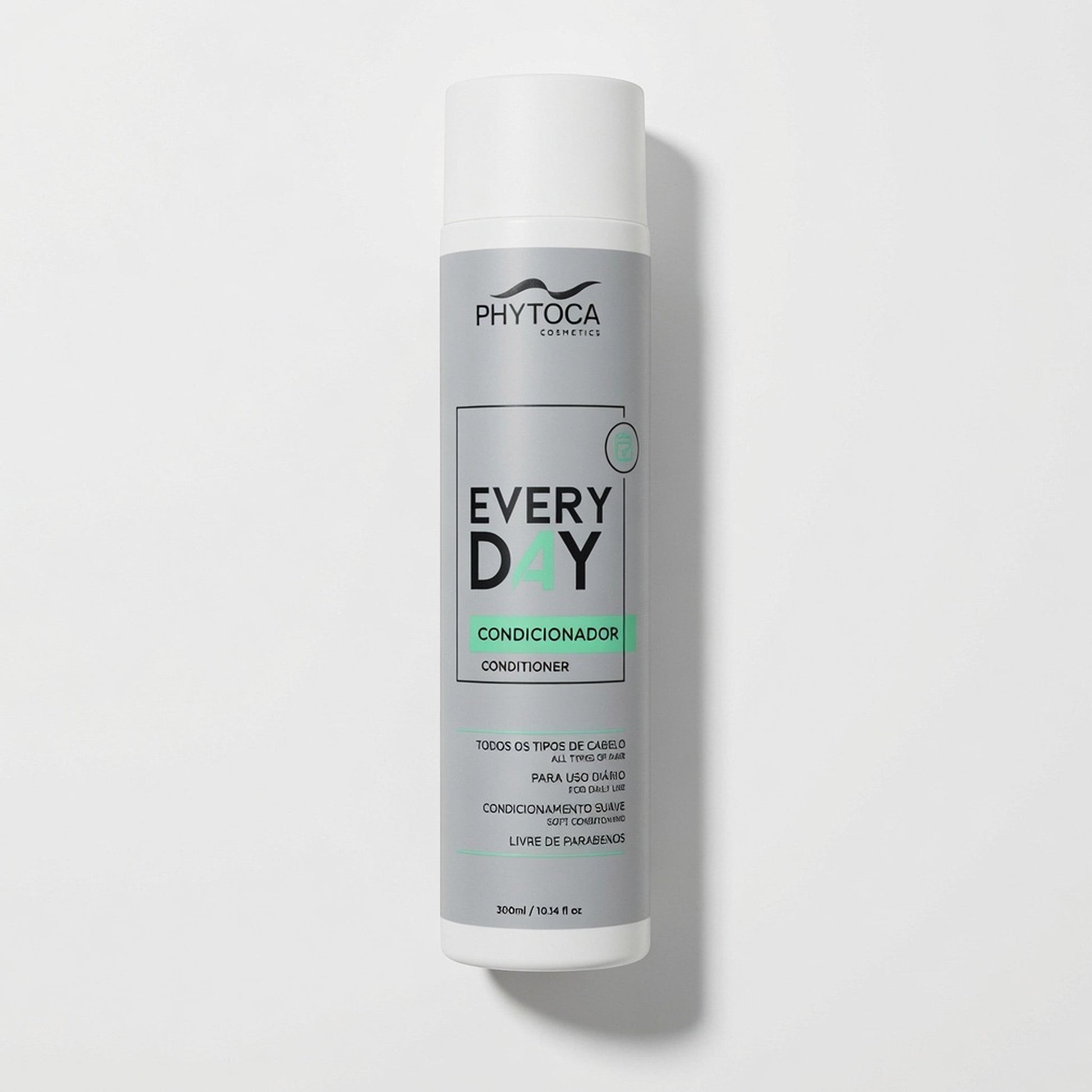 Acondicionador Phytoca USA Every Day en envase cilíndrico gris para nutrición y brillo de todo tipo de cabello.
