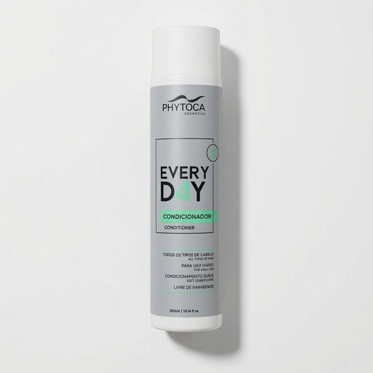 Acondicionador Phytoca USA Every Day en envase cilíndrico gris para nutrición y brillo de todo tipo de cabello.