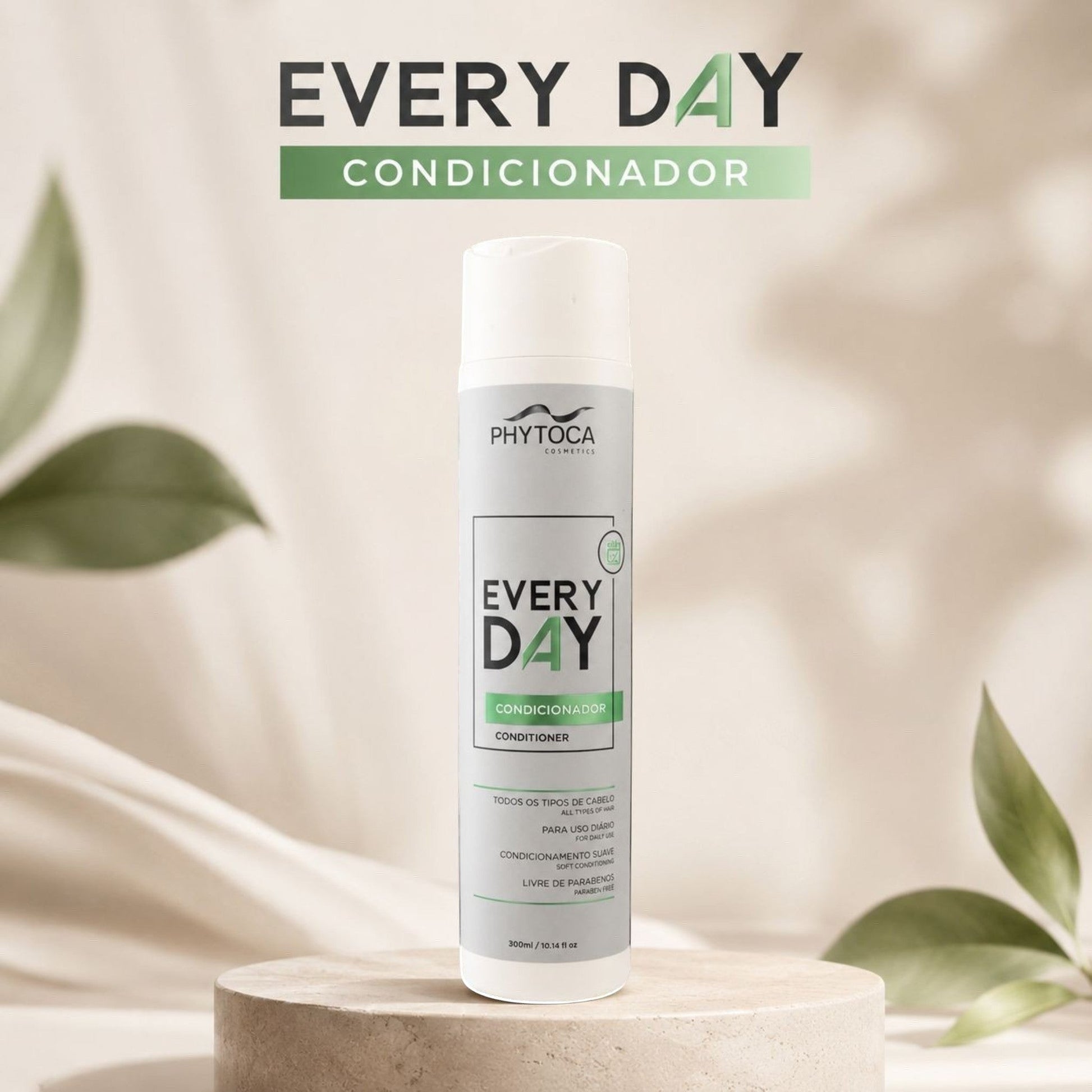 Acondicionador Phytoca USA Every Day para todo tipo de cabello en envase blanco sobre base de piedra