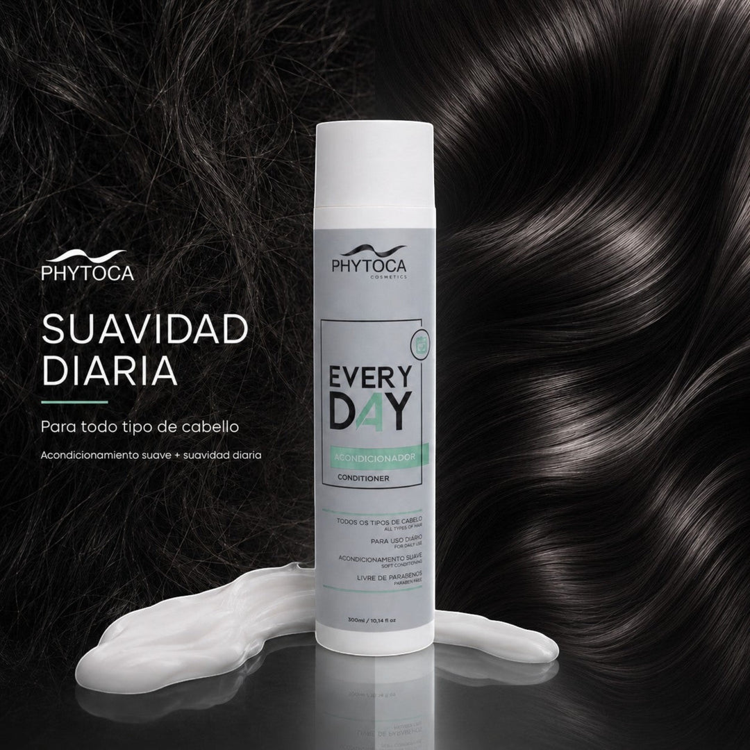 Acondicionador Phytoca USA Every Day para todo tipo de cabello con aceite de coco y siliconas sobre fondo de pelo oscuro