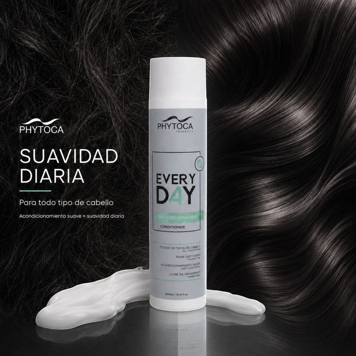 Acondicionador Phytoca USA Every Day para todo tipo de cabello con aceite de coco y siliconas sobre fondo de pelo oscuro