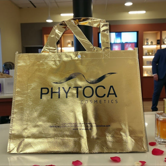Bolsa de compras dorada brillante Phytoca USA con logo impreso y acabado metalizado