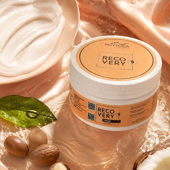 Mascarilla capilar Phytoca USA Recovery en tarro blanco sobre fondo satinado con manteca de karité y crema reparadora