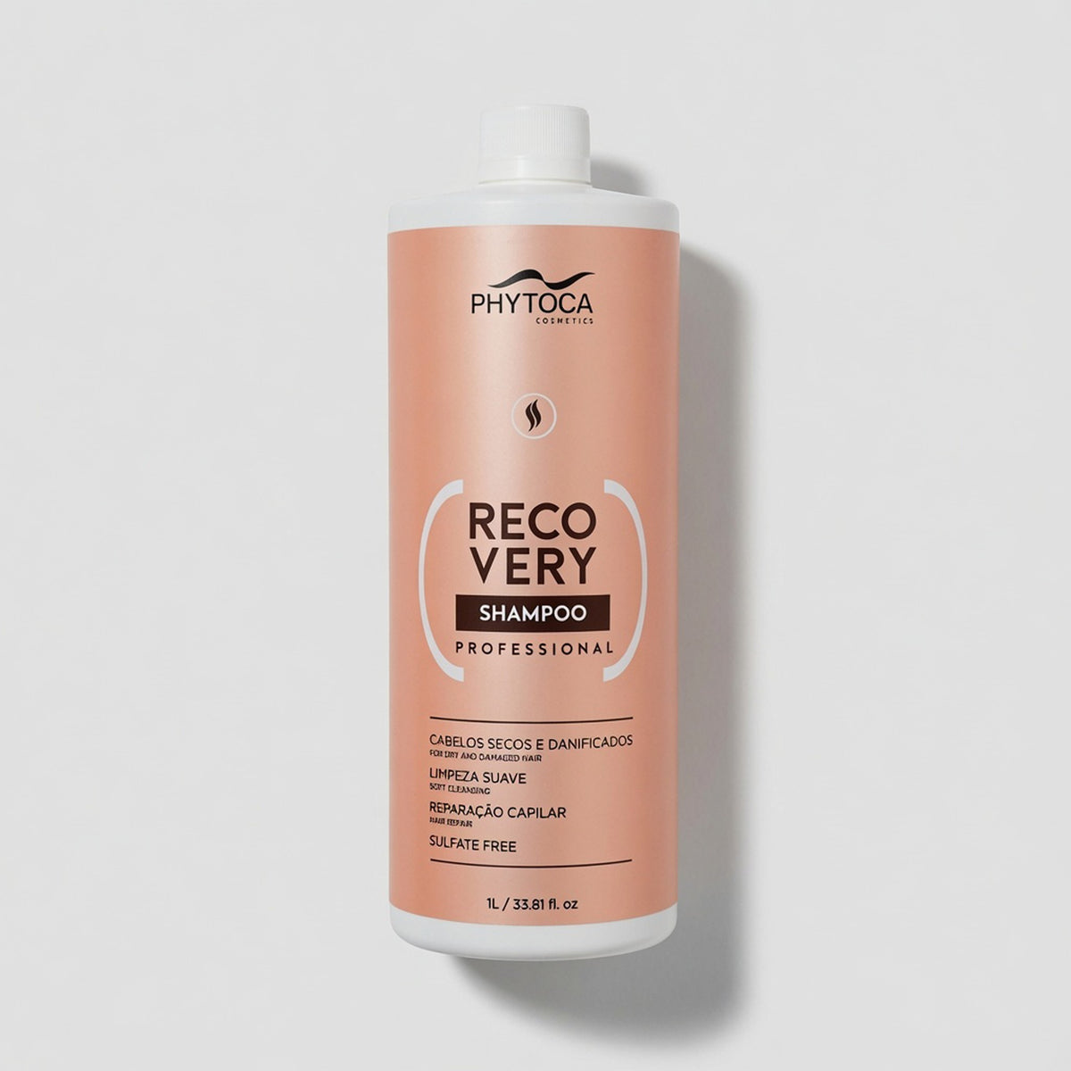 Champú reparador profesional Phytoca USA Recovery de 1 litro en envase color melocotón para cabello dañado.